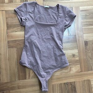 Free people one piece stretch top with button bottom. Square neck; flattering